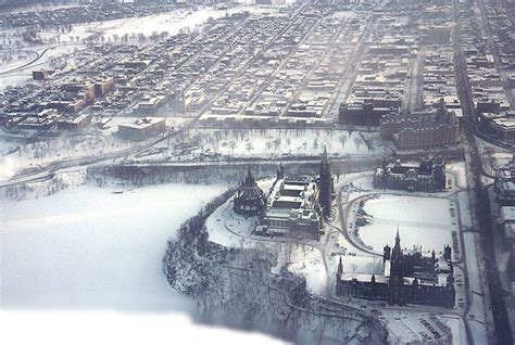 an aerial view of a city in winter