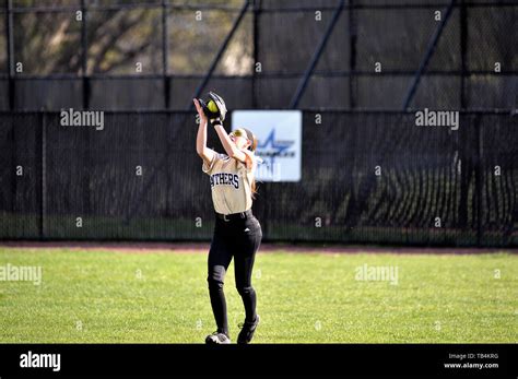 Outfielder making a routine catch of a fly ball Stock Photo - Alamy