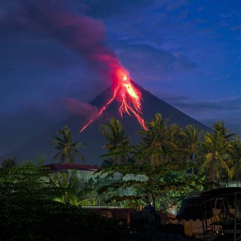 Mayon volcano spews thick lava as seen from Legazpi in the Philippines on January 23rd 2018 ...
