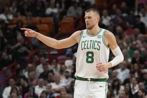 Celtics' Kristaps Porzingis sprains left ankle, leaves game against ...