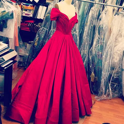 Royal red gown being worked in the studio today. The Fall collection ...