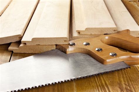 Carpenter S Saw with Wooden Planks Stock Image - Image of home, construction: 29496867