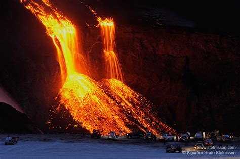 Lightning over the volcano and jeeps parked on the lava: Photographer's ...