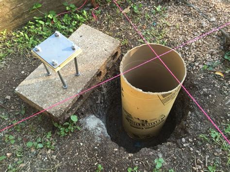 Pouring concrete footers in sono tubes for a garden shed structure. 4x4 ...