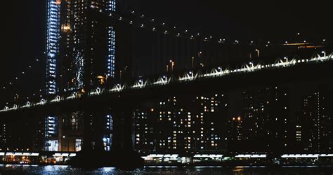 Night Manhattan Bridge timelapse 4K New York. Low angle view of ...