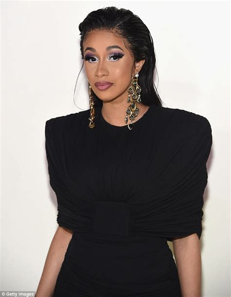 Cardi B cuts an elegant figure in curve-highlighting black dress at Tom Ford's NYFW show | Daily ...