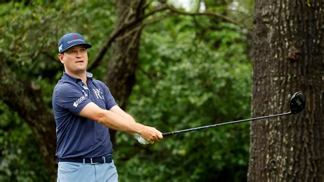 Masters champion Zach Johnson watches a stroke from the No. 2 tee ...