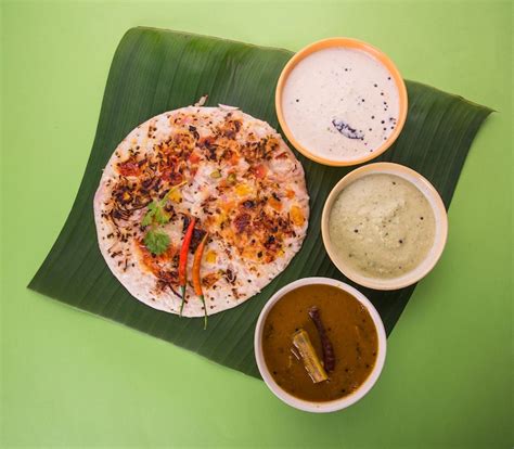 Premium Photo | South indian food uttapam or ooththappam or uthappa is ...