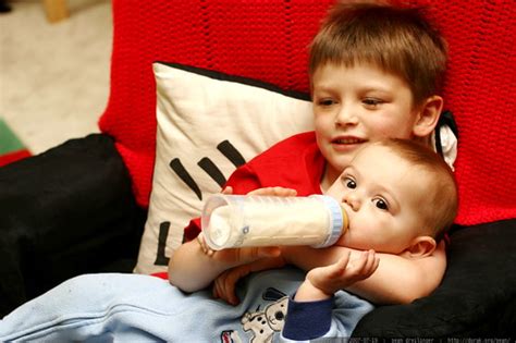 photo: big brother, bottle feeding his little brother MG 9766 - by ...