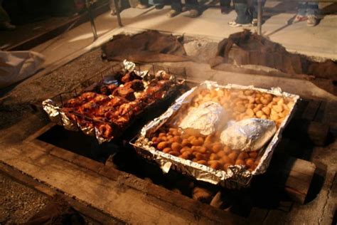 Hangi.... traditional Maori feast... to which I have been invited to ...