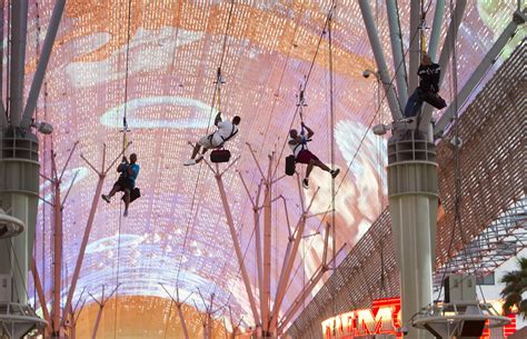 Canadian tourist rescued from zip line high above Las Vegas street