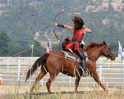 Awesome shot of Larkin Hastings shooting a Tatar bow from horseback. Photo courtesy of Carla ...