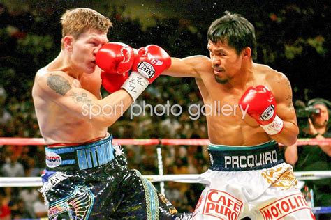 Manny Pacquiao jabs v Ricky Hatton Images | Boxing Posters | Manny Pacquiao