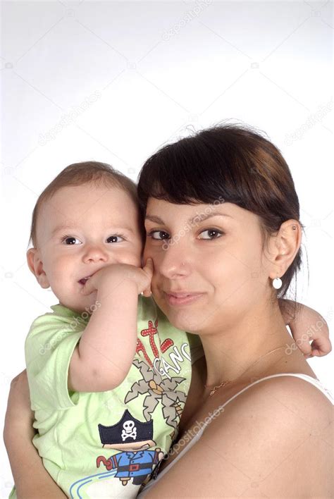 Mom holding her baby | Mom holding her baby — Stock Photo © aletia #6026200