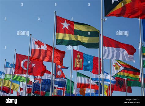 Many Flags blowing in the wind Stock Photo - Alamy