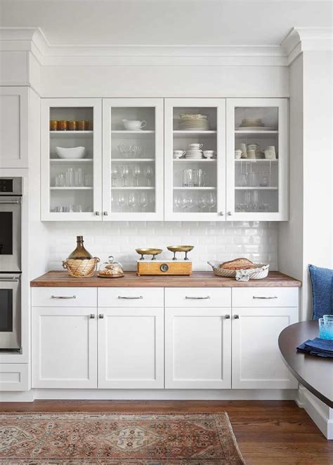 Blog | Centered by Design | White modern kitchen, White kitchen design, Glass kitchen cabinets