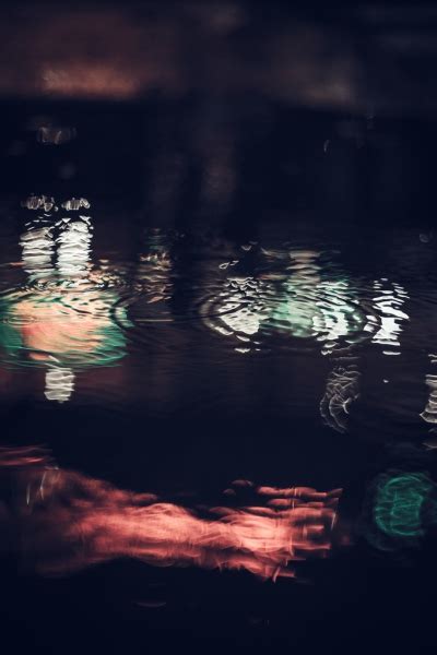 Reflection of lights on calm water at night Free stock photos in jpg ...