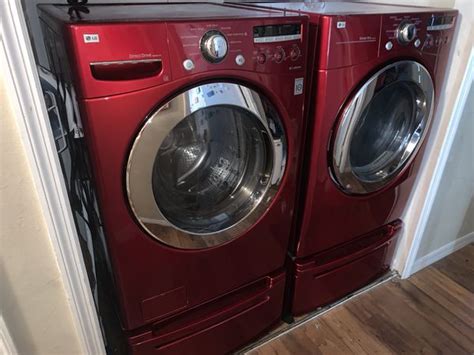 Red LG front load Washer and Dryer set w/pedestals for Sale in Daytona ...