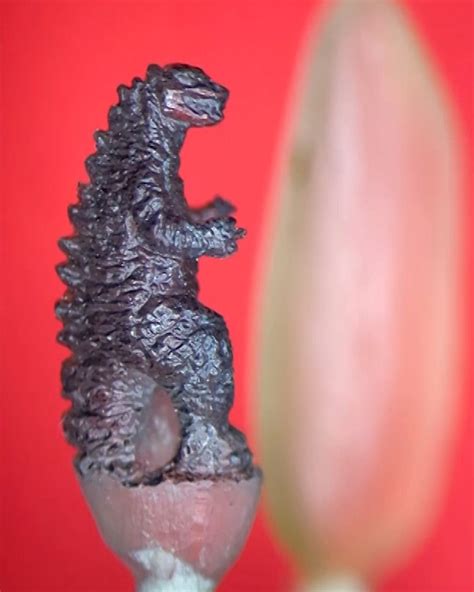 Carving Godzilla On A Grain Of Rice | Carving Godzilla is hard enough, but what about doing it ...