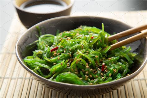 Wakame seaweed salad with sesame and | High-Quality Food Images ~ Creative Market