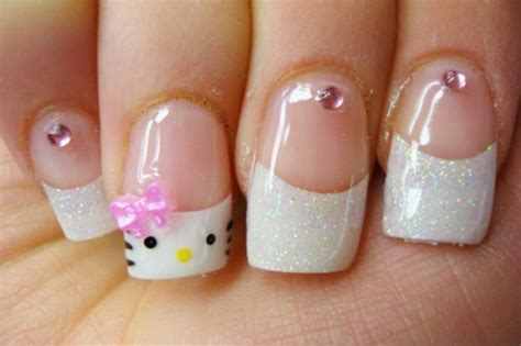 acrylics, glitter, hello kitty, nails - image #314433 on Favim.com