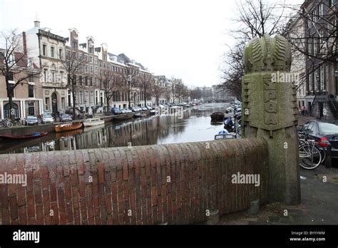 Amsterdam canal bridge Stock Photo - Alamy