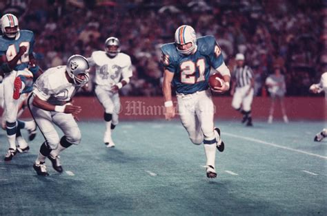 Jim Kiick charges into Oakland. 1972 Miami Dolphins, Miami Dolphins ...