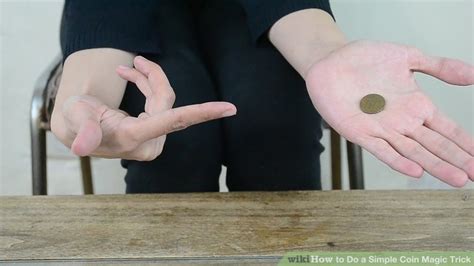 4 Ways to Do a Simple Coin Magic Trick - wikiHow