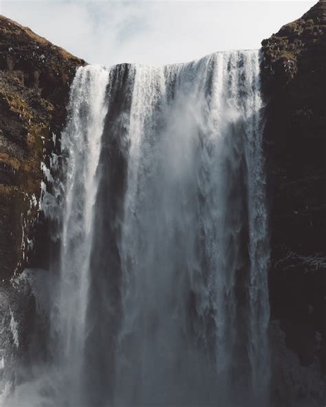 Waterfalls on Brown Cliff · Free Stock Photo