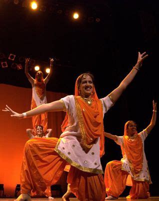 Pretty orange. | Bhangra, Girl costumes, Dance of india