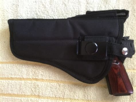 Holster for buckmark with red dot? | Rimfire Central Firearm Forum