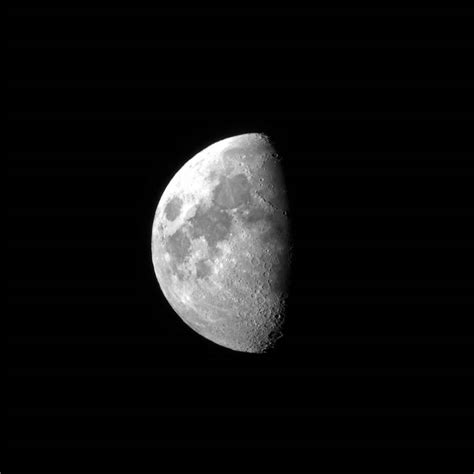 Picture Of Half Moon Seen From A Small Telescope