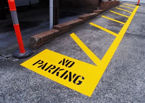 Parking Spaces and Colored Curbs: Road Markings Guide