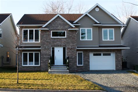 Stunning Blend of Brick and Vinyl Siding on Dartmouth Home