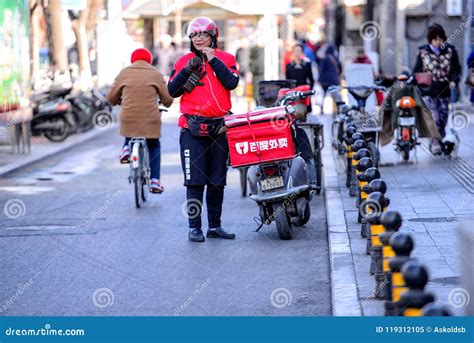 BEIJING, CHINA - MARCH 10, 2016: Food Delivery Courier with Sco Editorial Image - Image of ...