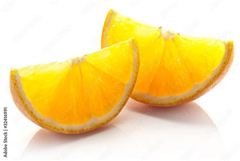 Orange slice on a white background. Stock Photo | Adobe Stock