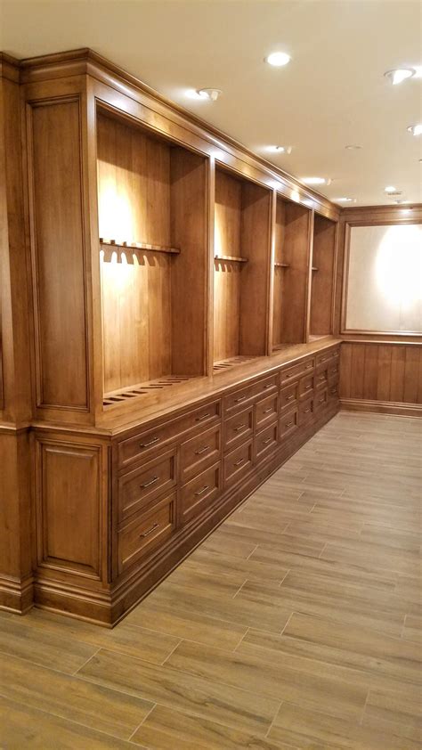 Alder gun room cabinets we built at work installed and finished! They turned out awesome! Waited ...