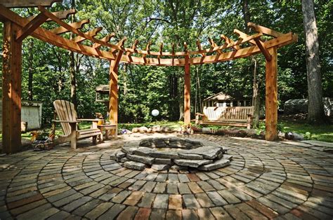 circular pergola, stone patio, and fire pit. #trellisfirepit # ...