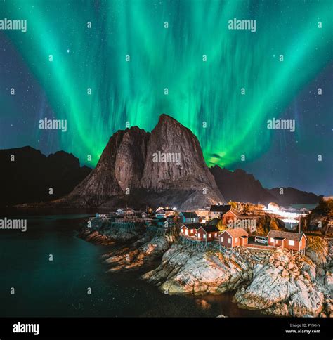 Northern Lights Aurora Borealis with classic view of the fisherman s village of Hamnoy, near ...