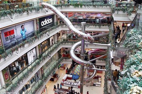 Chinese shopping mall built a giant slide to entertain customers | Daily Mail Online