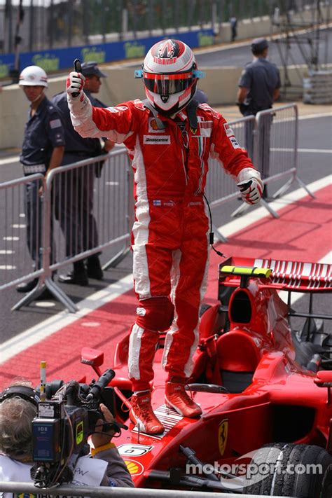 Race winner and 2007 World Champion Kimi Raikkonen celebrates at ...