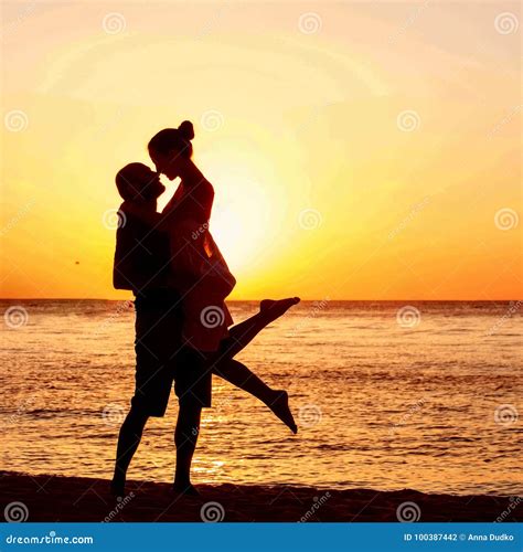 Romantic Couple on the Beach at Colorful Sunset on Background Stock ...