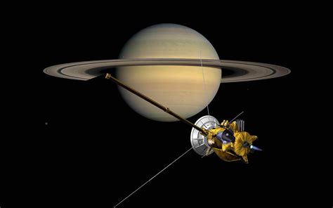 Probe Cassini-front of the planet Saturn with rings-Desktop Wallpaper ...