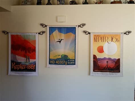 A friend printed out the NASA travel posters for me on fabric. Here they are sewn and hanging ...