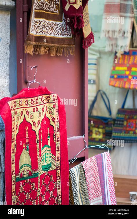 Street market, souvenirs shop with carpets, Old city Jerusalem, Middle ...