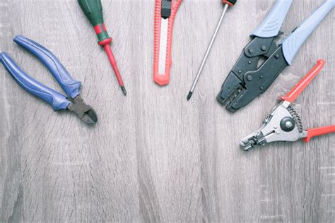 Electrician S Tools on a Wooden Background. Set of Electrician S Tools ...