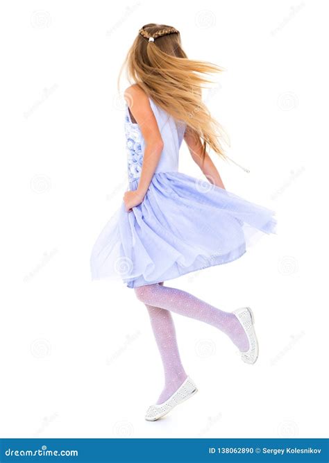 A Little Girl in a Dress is Spinning. Stock Photo - Image of ballet, child: 138062890