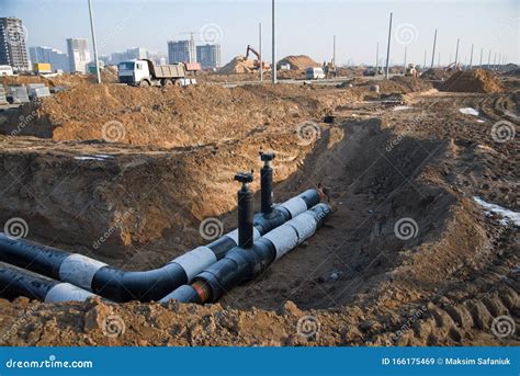 Laying of Underground Storm Sewer Pipes. Installation of Water Main, Sanitary Sewer. Plastic ...