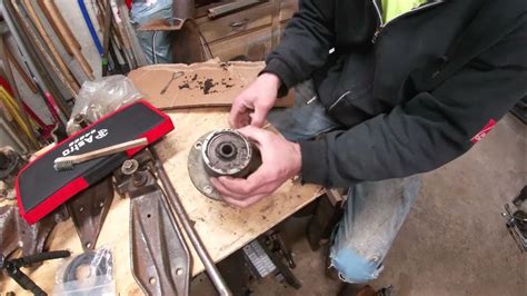 Scag spindle rebuild - YouTube