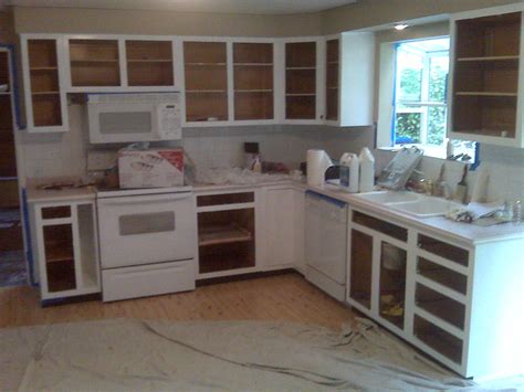 DONE! Painting Kitchen cabinets and doors! | yugenro | Flickr